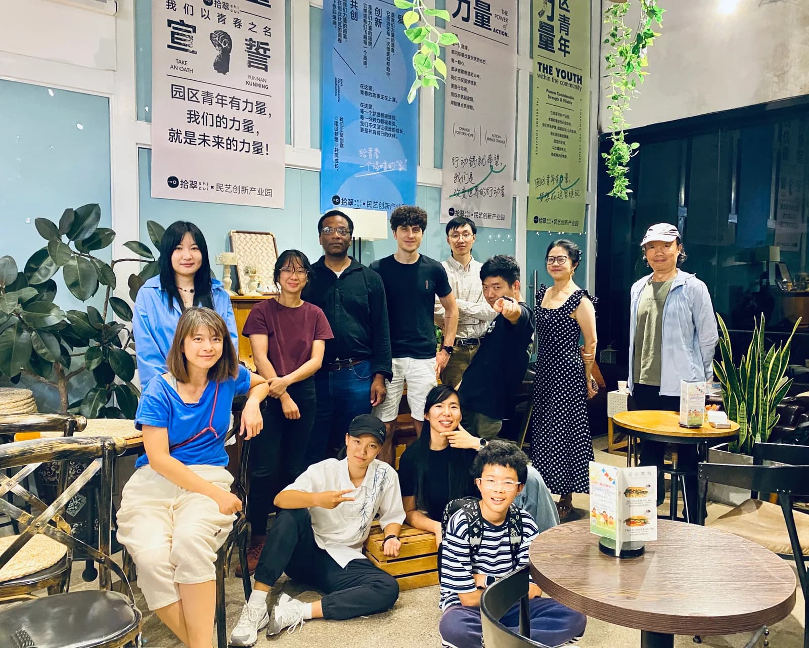 A large group photo at the end of a board game night in Kunming