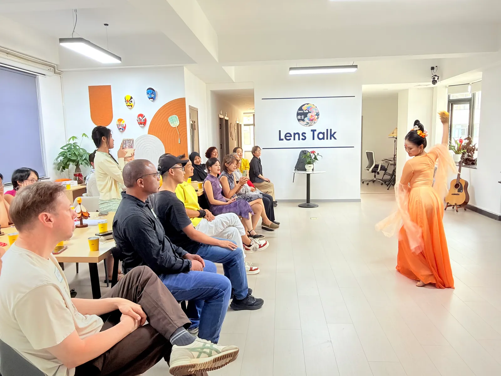 The room watching a classical Chinese dance at our Lens Talk venue
